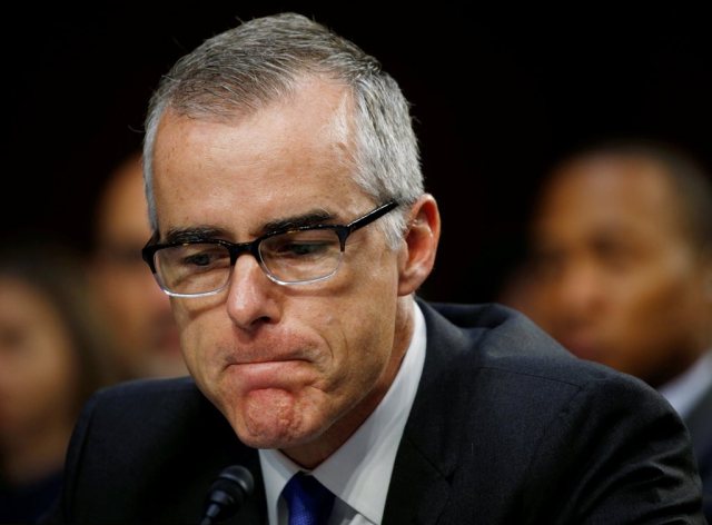 FILE PHOTO: FBI Deputy Director Andrew McCabe pauses while testifying before a Senate Intelligence Committee hearing on the Foreign Intelligence Surveillance Act (FISA) in Washington, U.S., June 7, 2017. REUTERS/Kevin Lamarque/File Photo