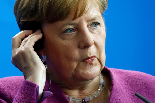 German Chancellor Angela Merkel attends a news conference with Danish Prime Minister Lars Lokke Rasmussen (not pictured) in Berlin, Germany, April 12, 2018. REUTERS/Fabrizio Bensch