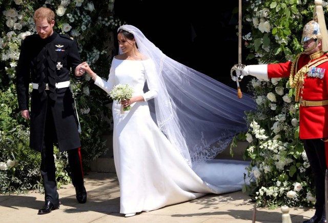 Prince Harry and Meghan Markle leave St George's Chapel in Windsor Castle after their wedding in Windsor, Britain, May 19, 2018. Andrew Matthews/Pool via REUTERS