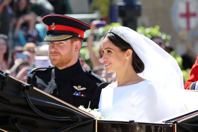 Meghan Markle and Prince Harry leave St George's Chapel at Windsor Castle after their wedding  Saturday May 19, 2018.  Gareth Fuller/Pool via REUTERS