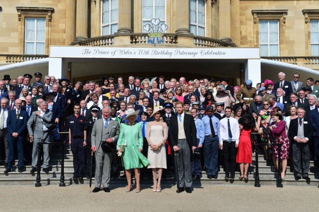 Britain'sÊPrince Harry and his wife Meghan, Duchess of Sussex, at a garden party at Buckingham Palace with Prince Charles and Camilla the Duchess of Cornwall, their first royal engagement as a married couple, in London, May 22, 2018. Dominic Lipinski/Pool via Reuters