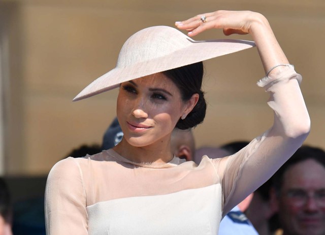 Meghan, Duchess of Sussex attends a garden party at Buckingham Palace, in London, Britain May 22, 2018. Dominic Lipinski/Pool via Reuters