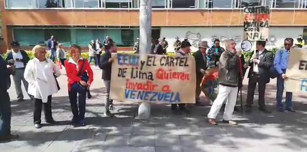 Protestantes comunistas rechazan reunión del Tiar, imagen cortesía.