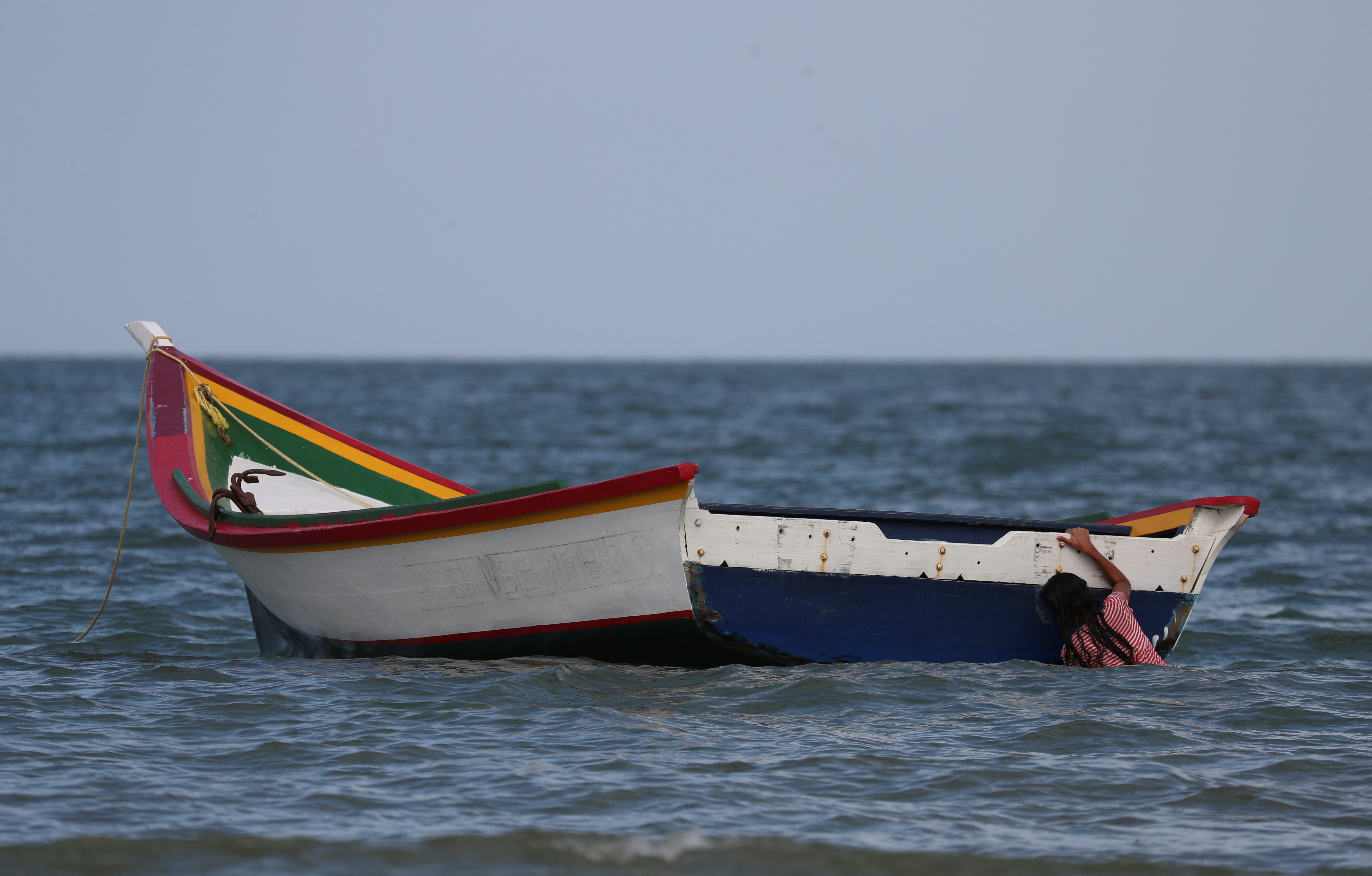 Reuters: Familias venezolanas buscan respuestas sobre migrantes desaparecidos en el mar