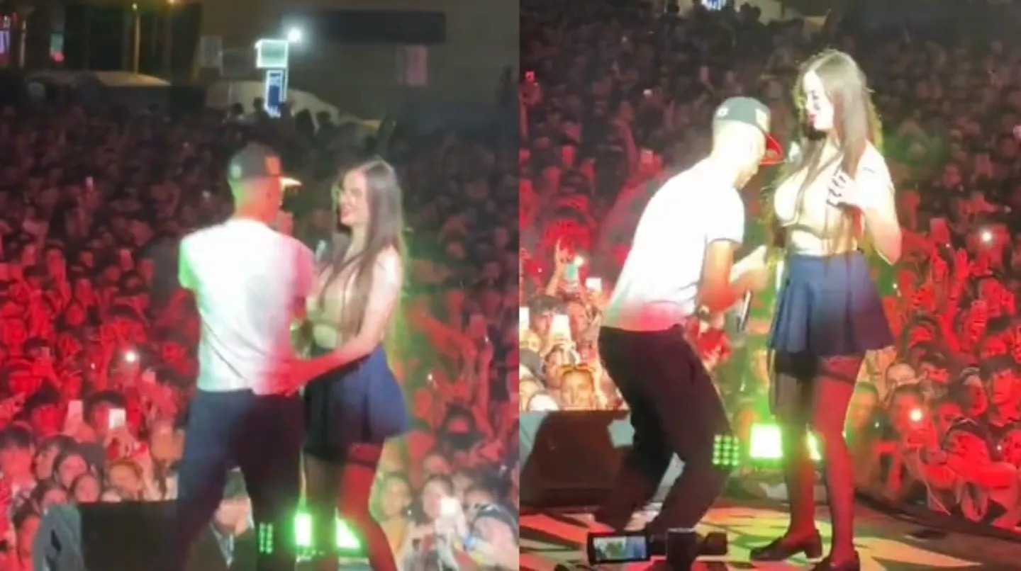 ¡Escándalo! Cantante le levantó la falda a una influencer y simuló practicarle sexo oral (VIDEO)