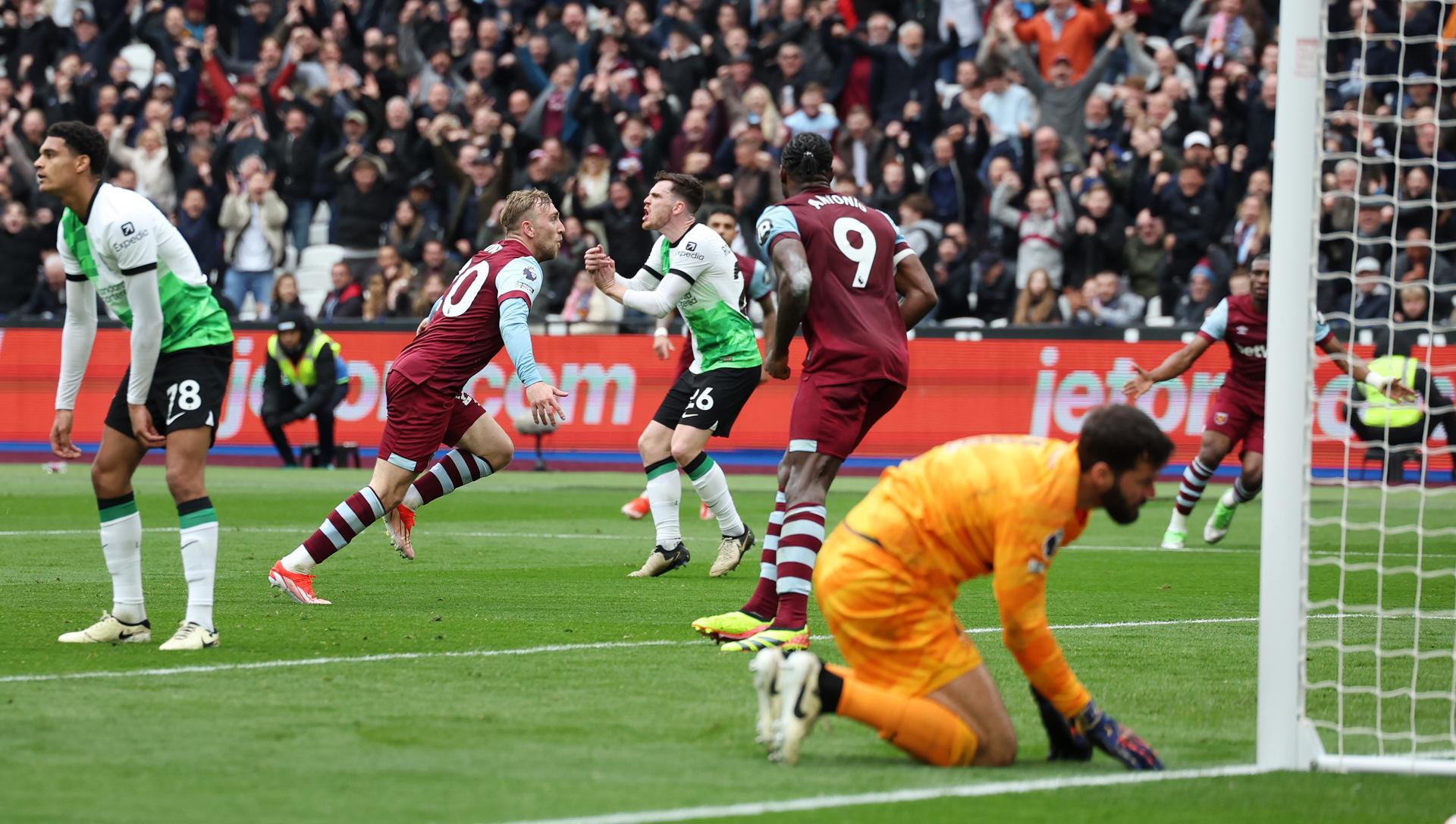 Liverpool cerró su caótica semana al igualar con el West Ham